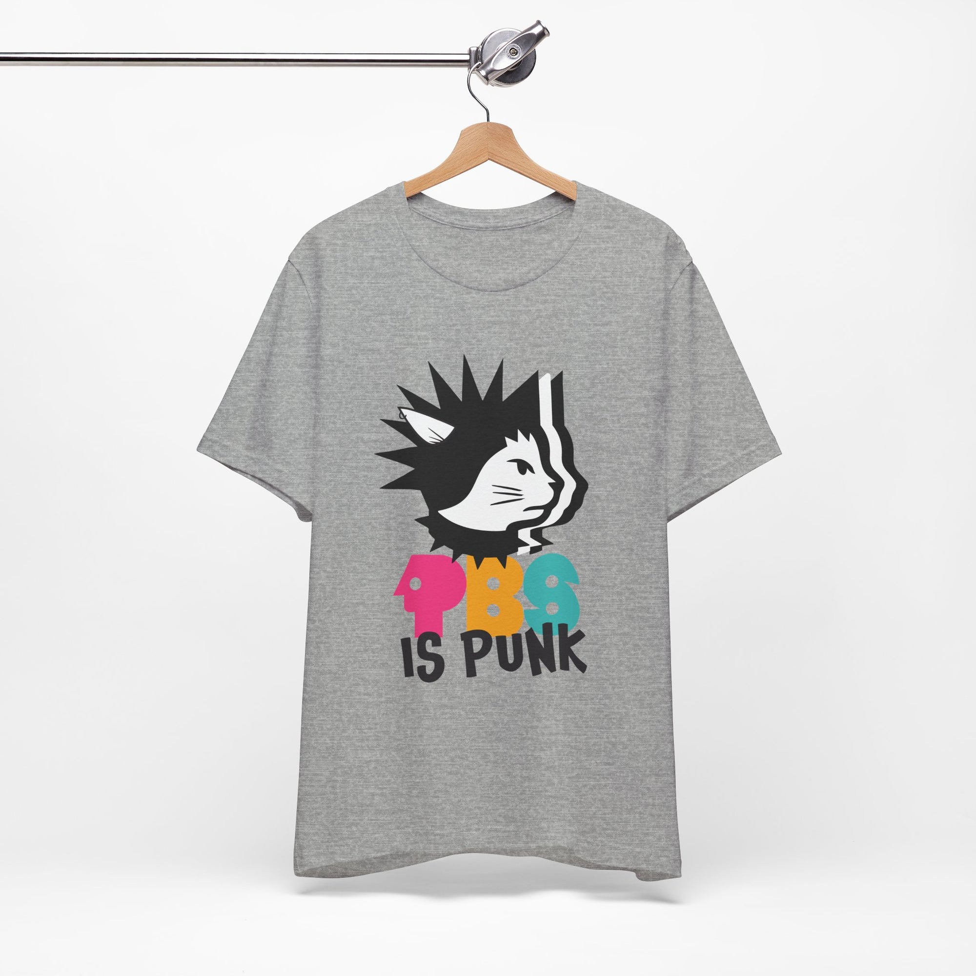 Grey t-shirt featuring a punk-style black cat graphic with colorful letters spelling “PBG” and black text that says “Is Punk.”
