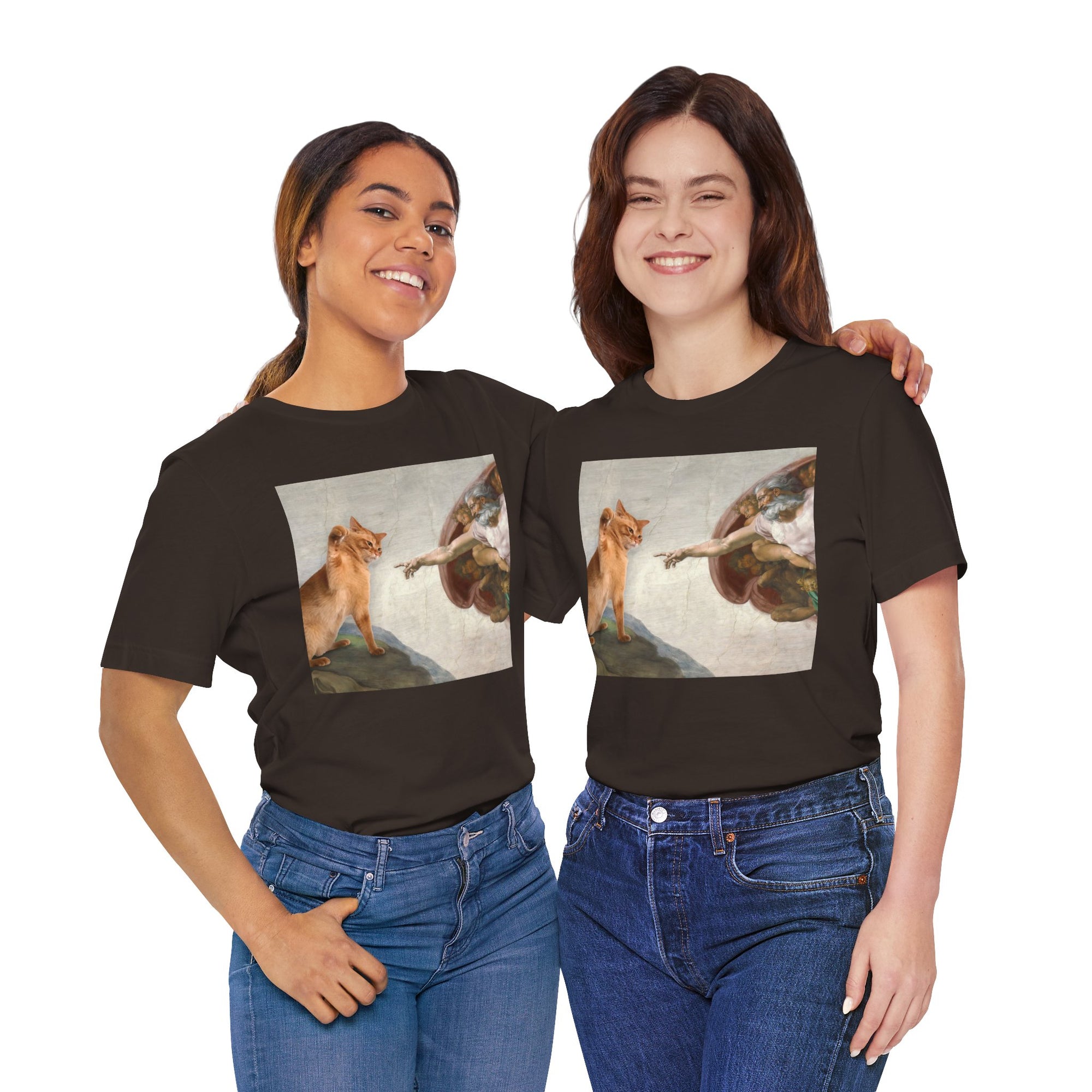 Two people wearing black t-shirts with artistic prints of a woman and a dog.