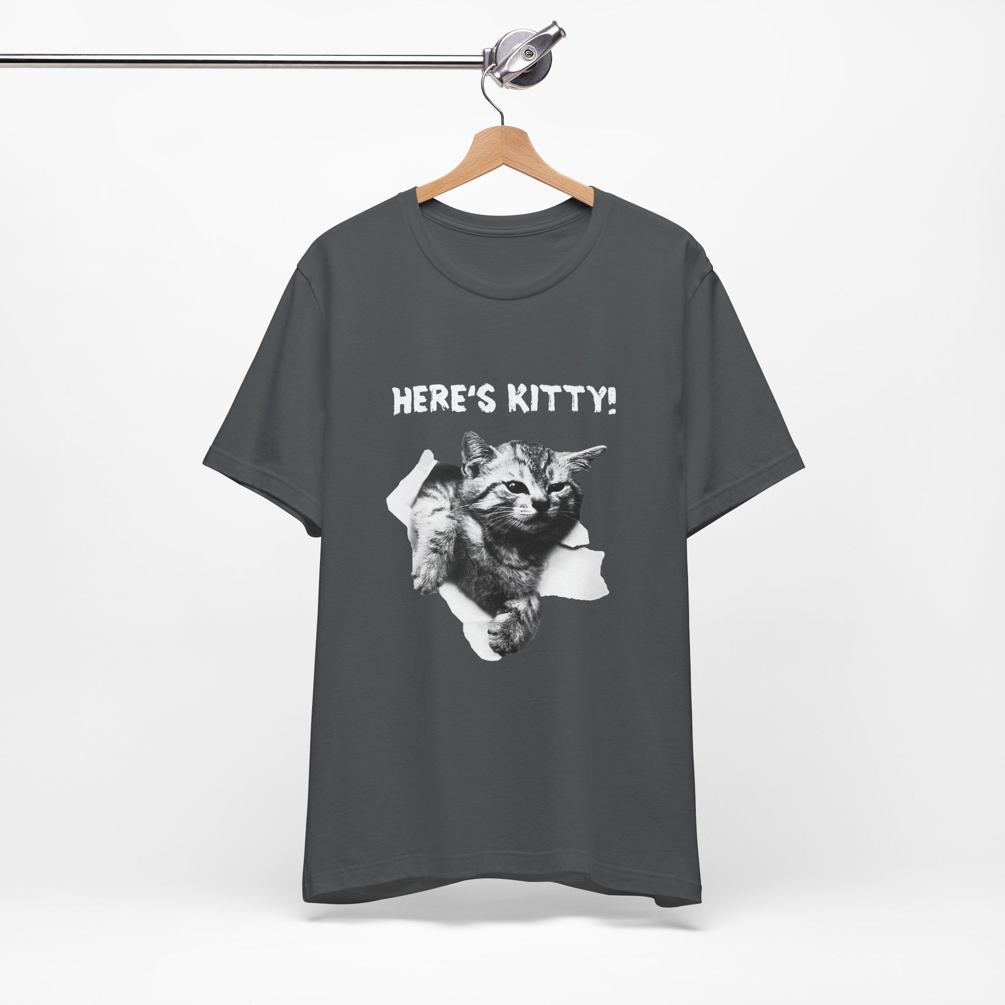Gray t-shirt with a cat graphic and 'HERE'S KITTY!' text on a hanger against a white background