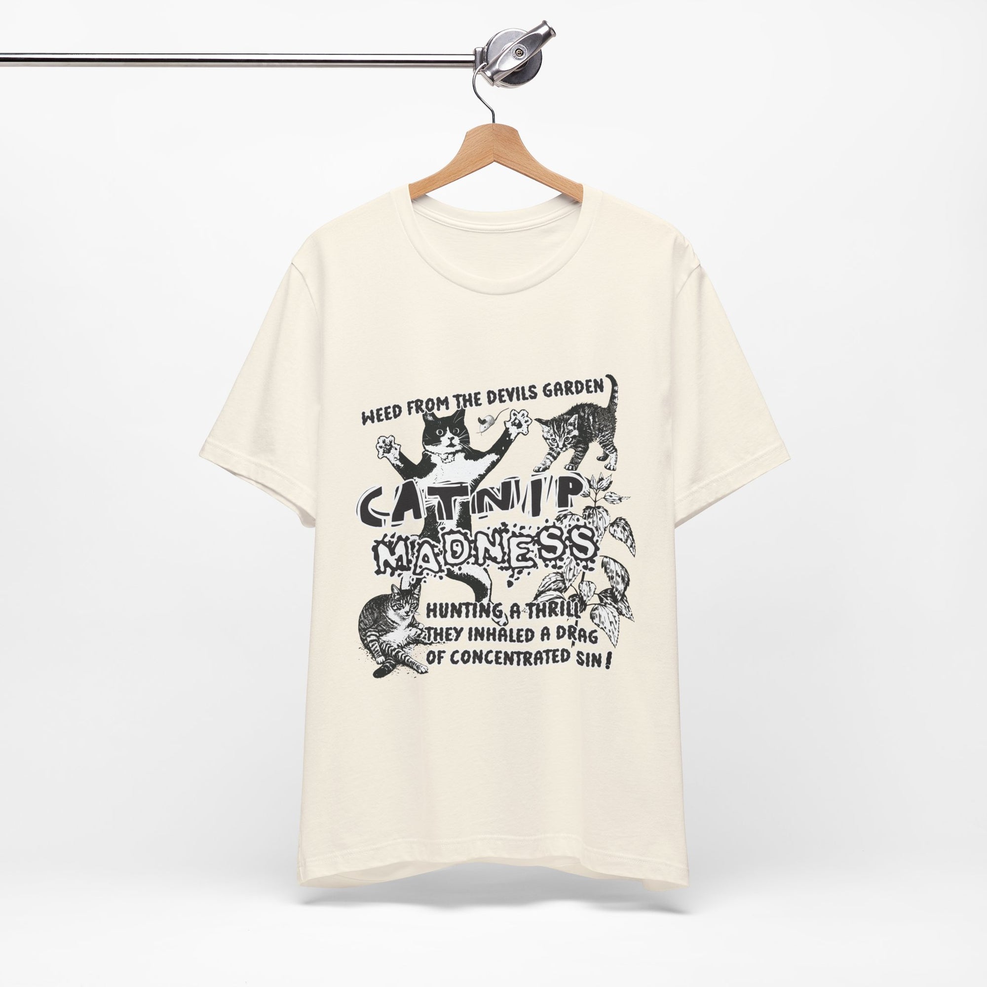 White t-shirt with black graphic design and text on a hanger against a white background