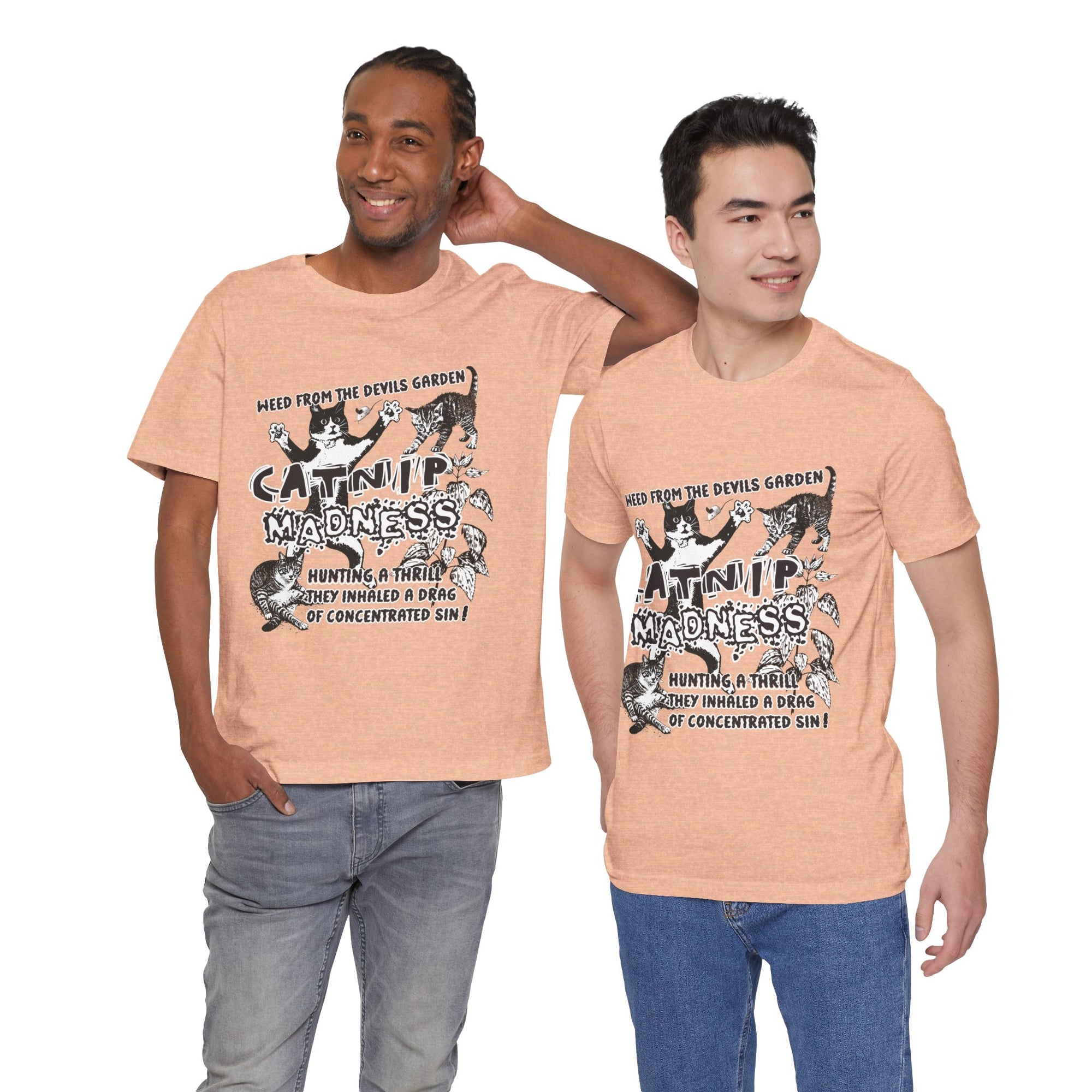 Two men wearing peach t-shirts with graphic designs and text.