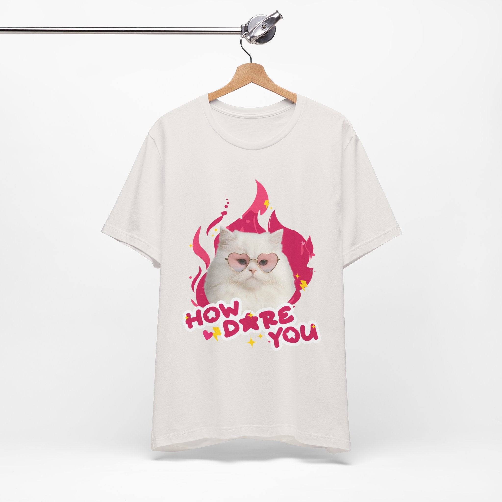White t-shirt with a cat graphic and text on a hanger against a white background