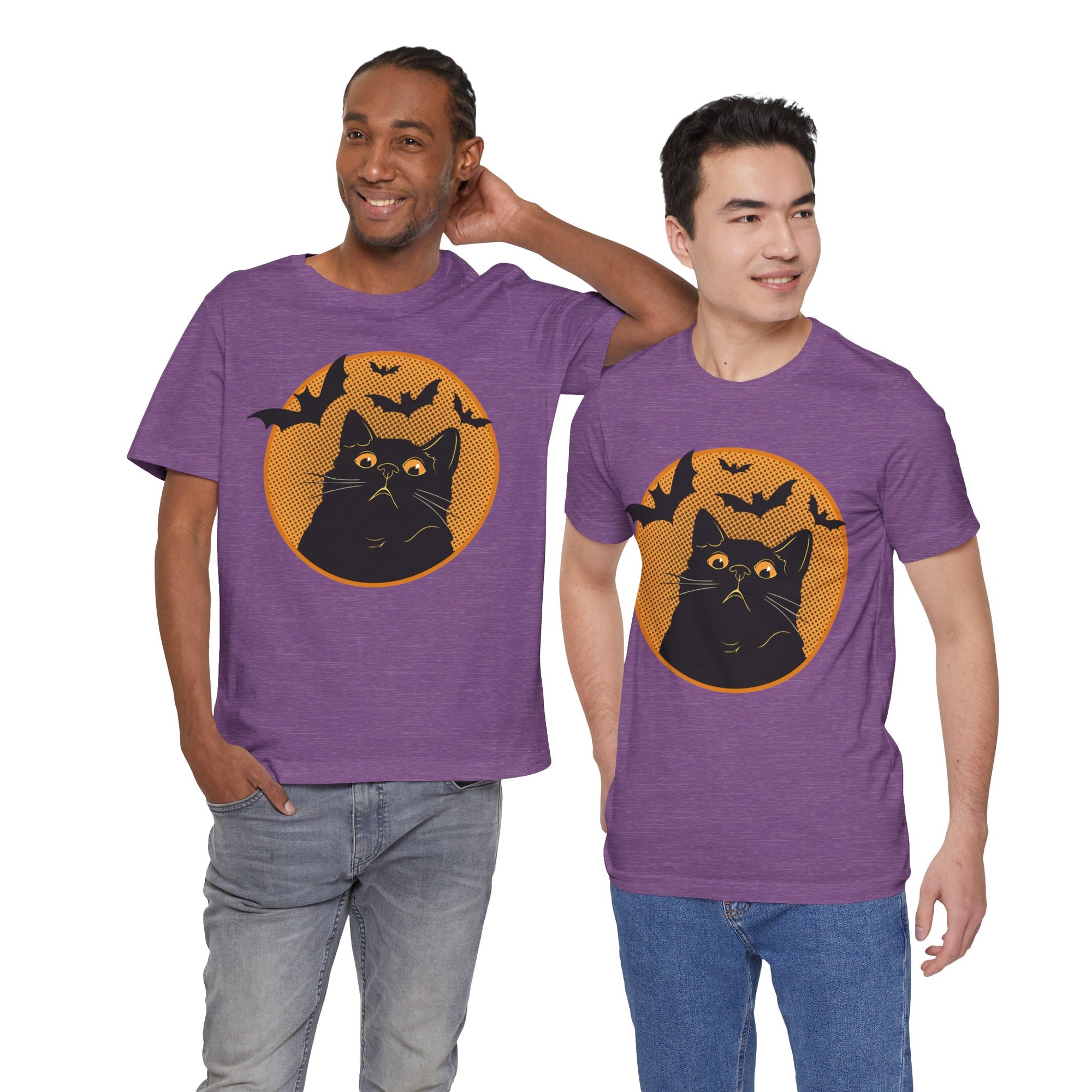 Two men wearing purple t-shirts with a black cat and bat design on a white background