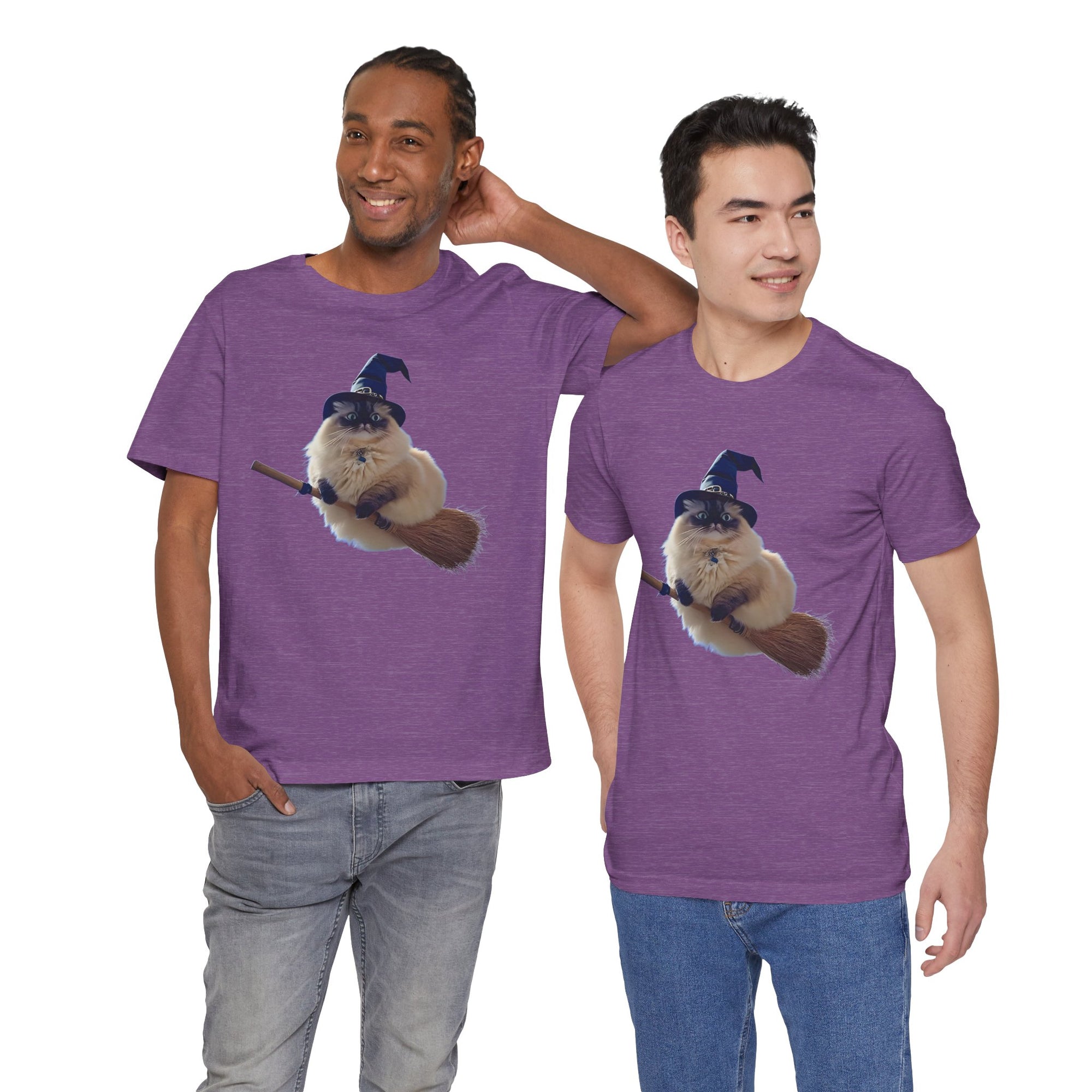 Two men wearing purple t-shirts with a graphic of a cat in a witch hat on a broomstick.