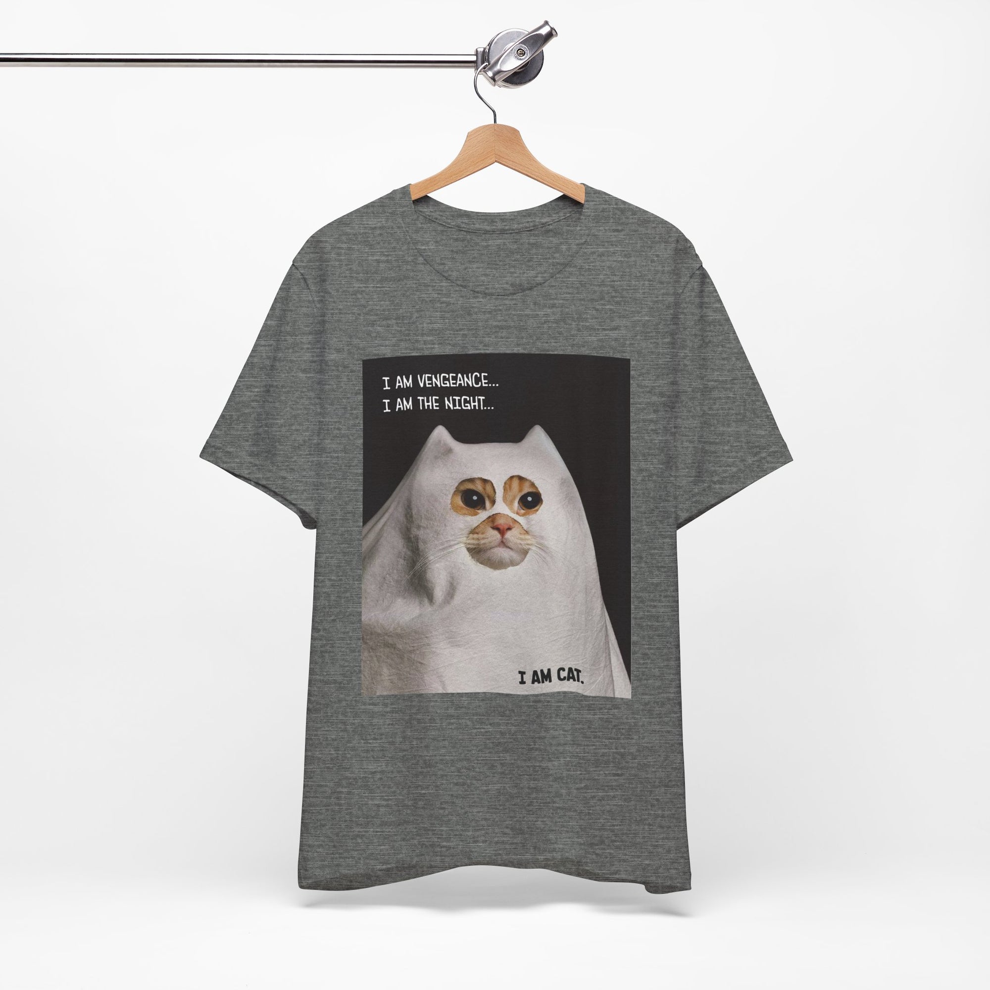 Gray t-shirt with a graphic of a cat and text on a hanger against a white background