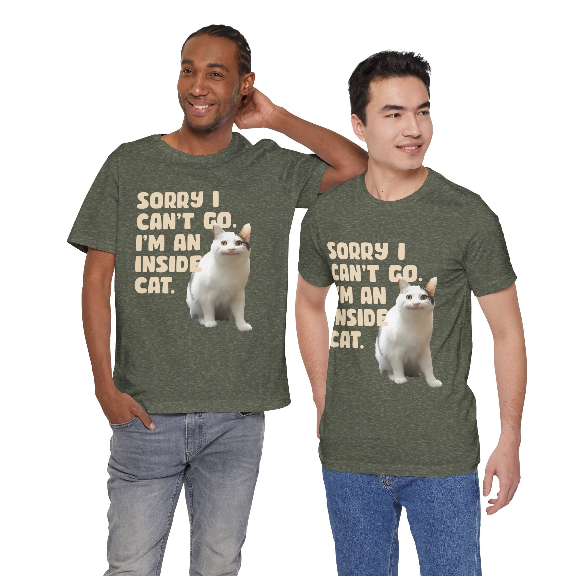 Two men wearing green t-shirts with a cat graphic and text.