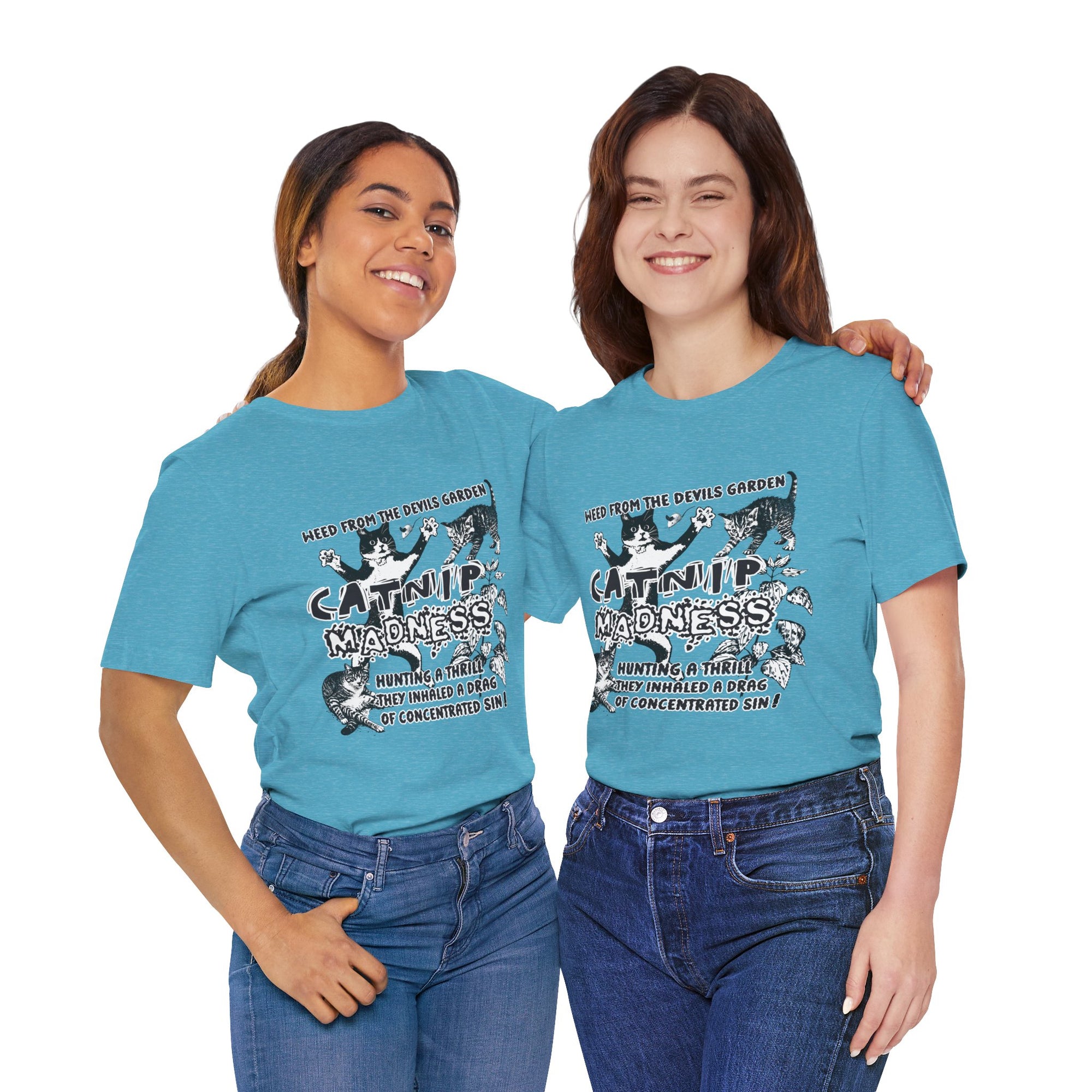Two people wearing blue t-shirts with a graphic design and text.