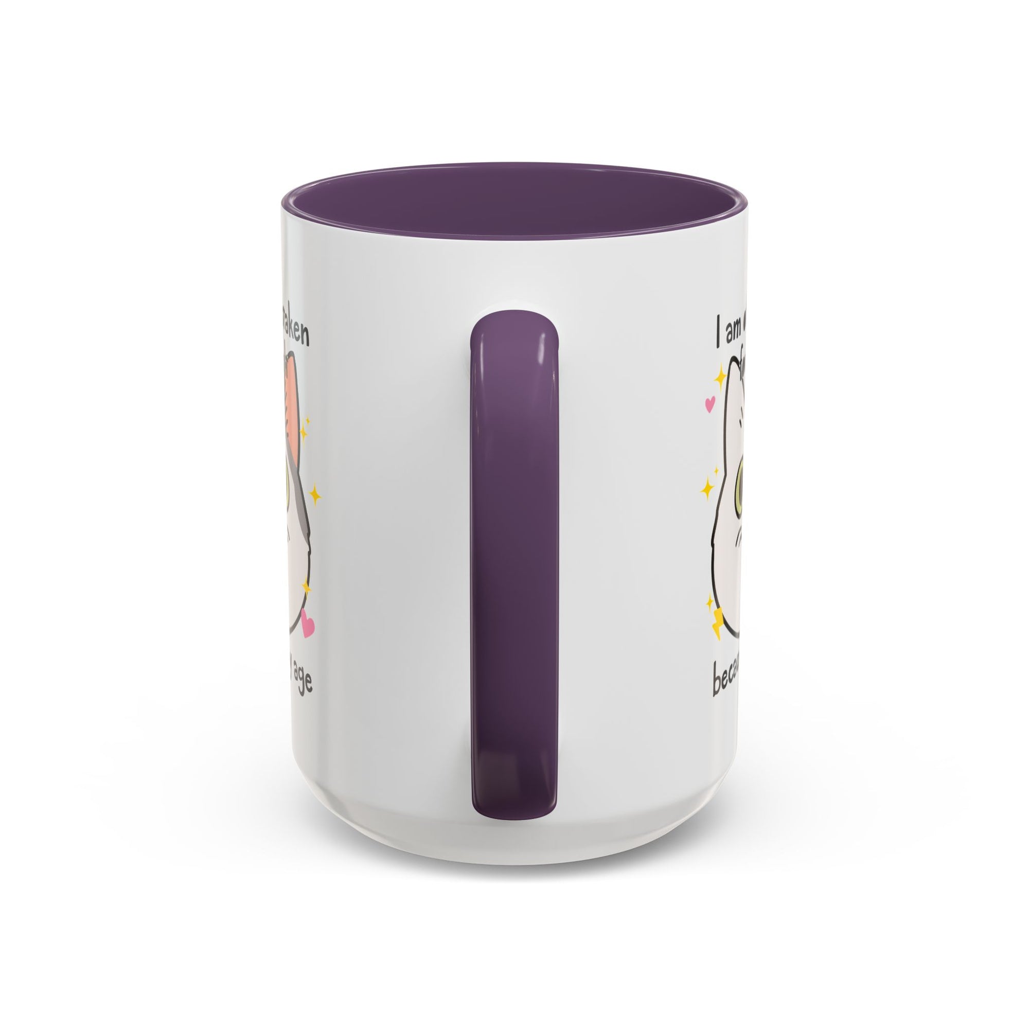 White ceramic mug with purple handle and interior featuring a cute wide-eyed cat face, hearts, sparkles, and the phrase “I am often mistaken for an adult because of my age.”
