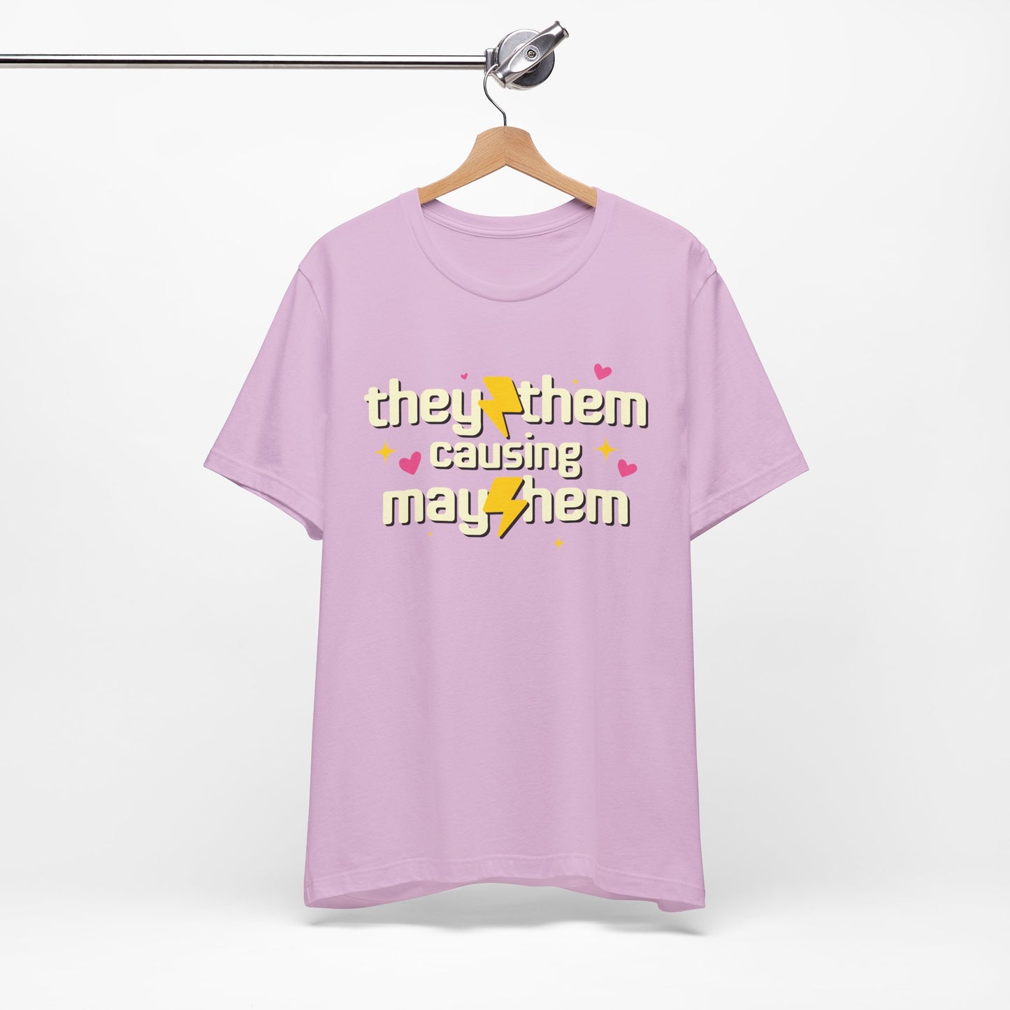 Purple t-shirt with text and graphics on a hanger against a white background