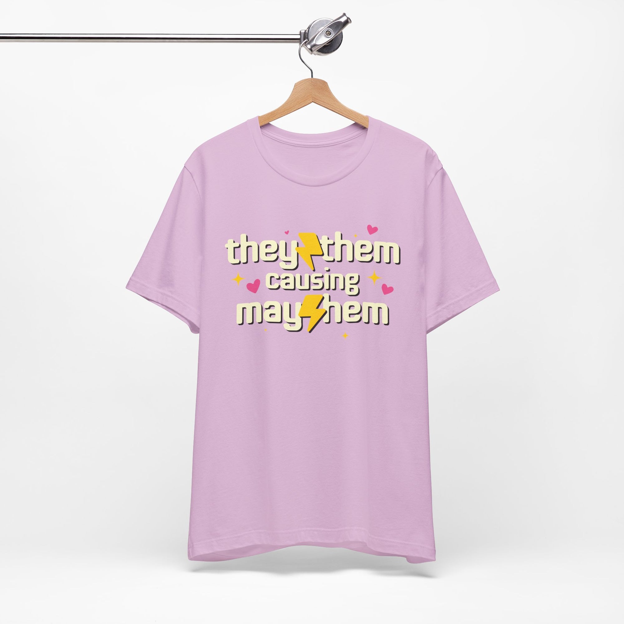 Purple t-shirt with text and graphics on a hanger against a white background
