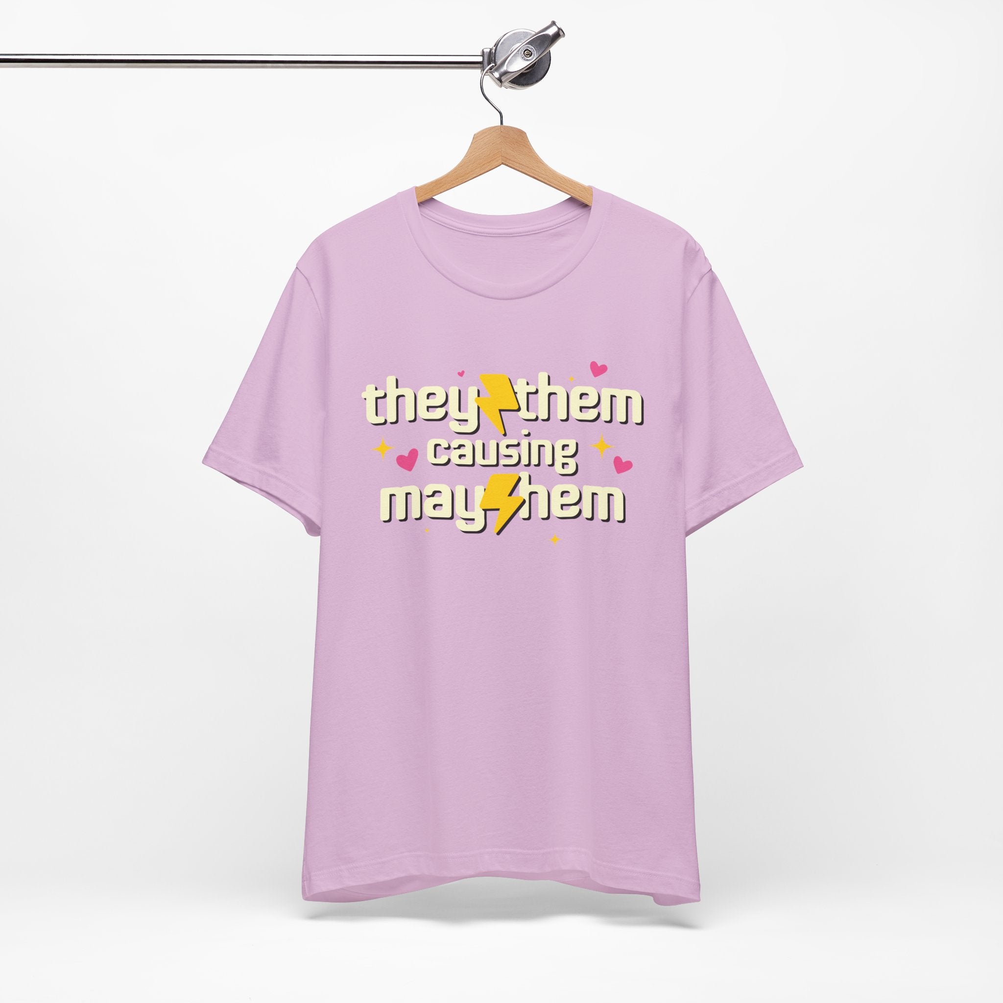 Purple t-shirt with text and graphics on a hanger against a white background