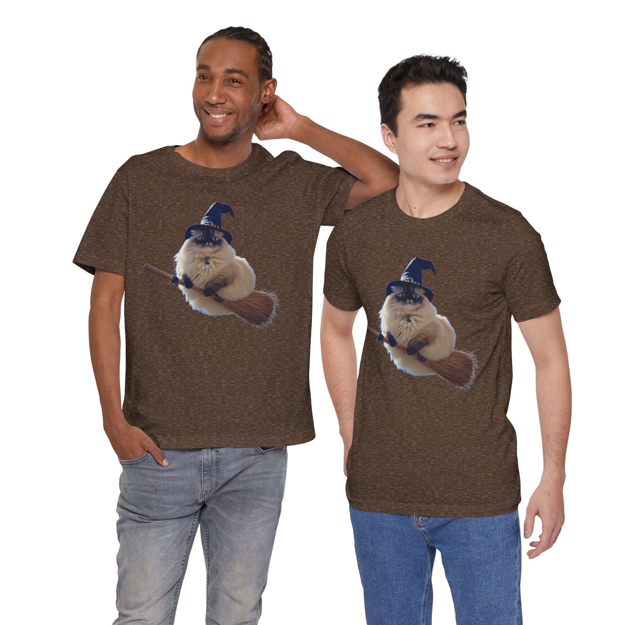 Two men wearing brown t-shirts featuring a fluffy cat wearing a blue witch hat and riding a broomstick.
