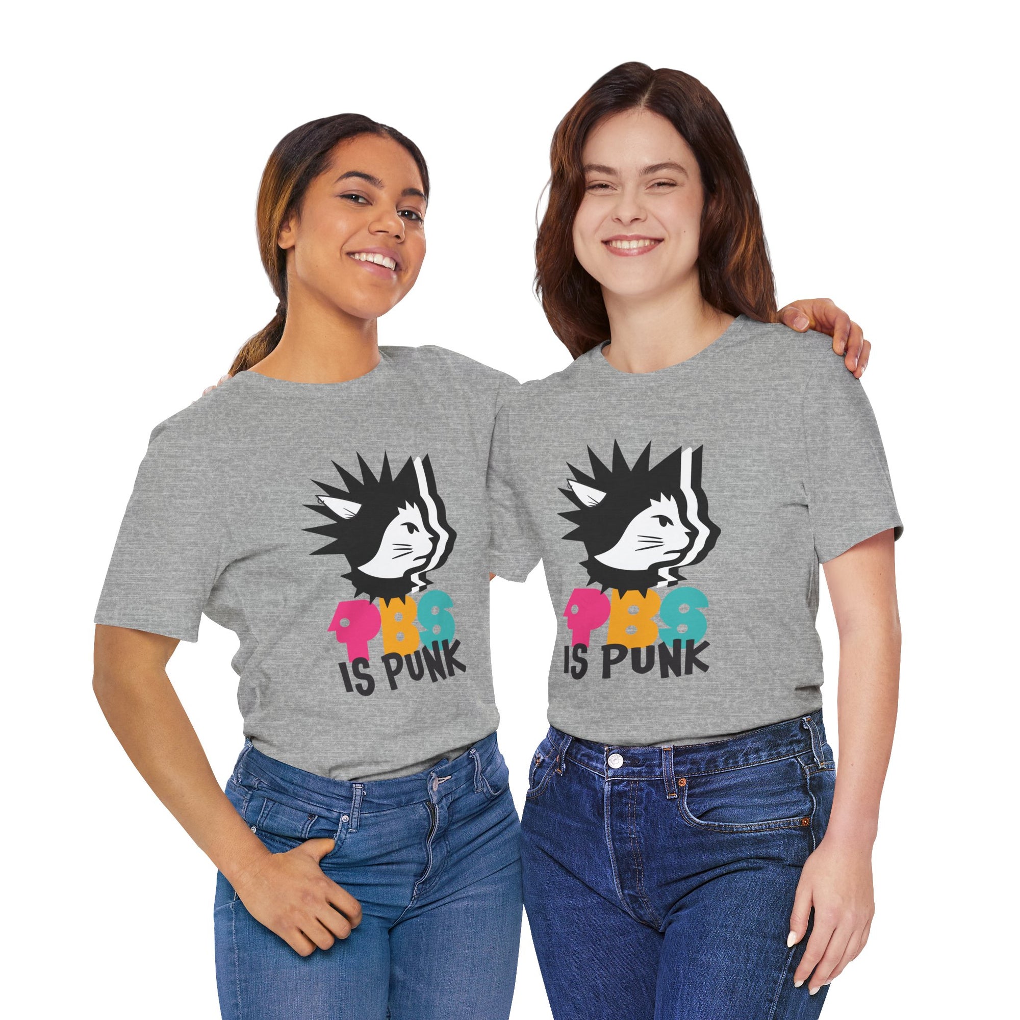 Two people wearing gray t-shirt featuring a punk-style black cat graphic with colorful letters spelling “PBG” and black text that says “Is Punk.”
