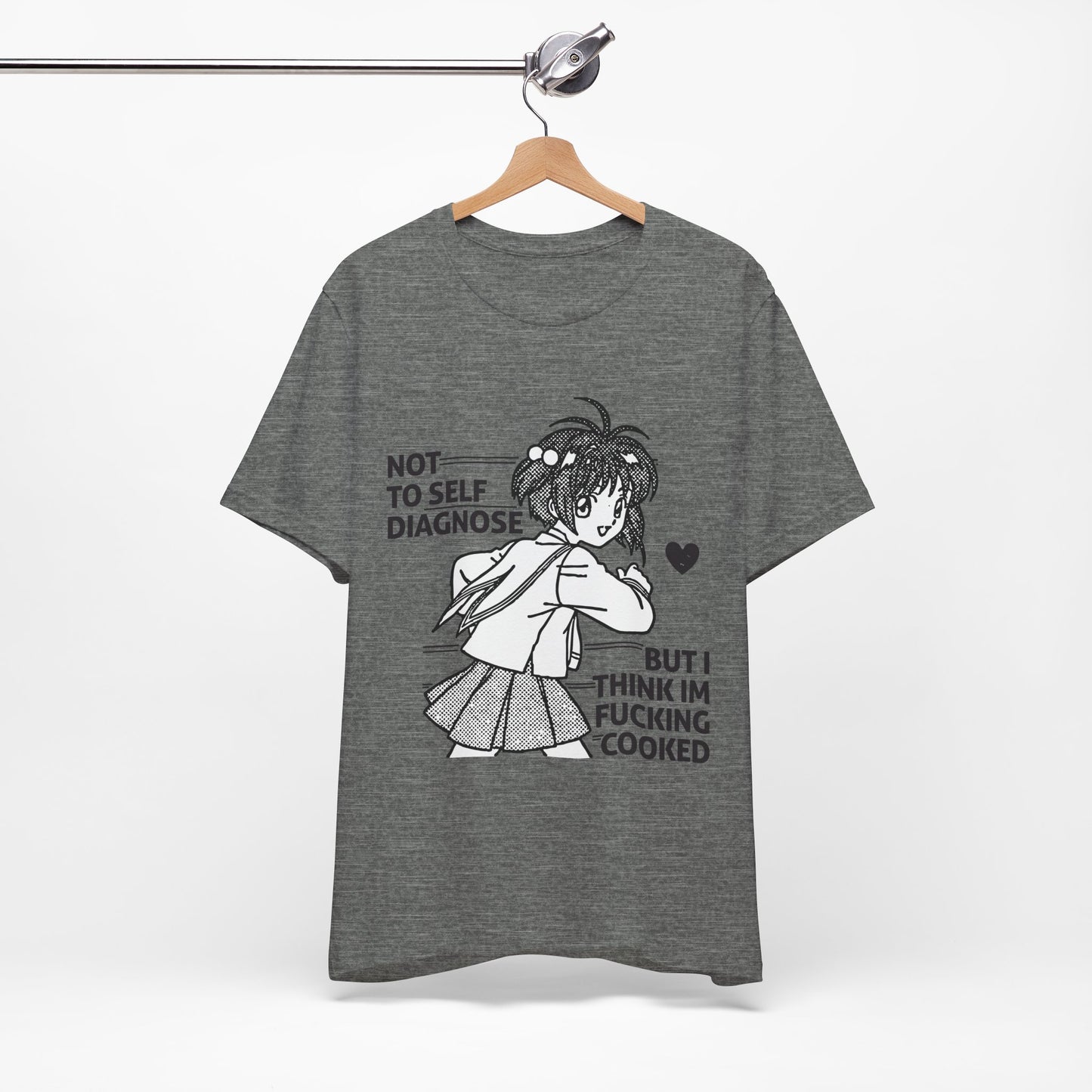 Gray t-shirt with an anime character graphic and text on a hanger against a white background