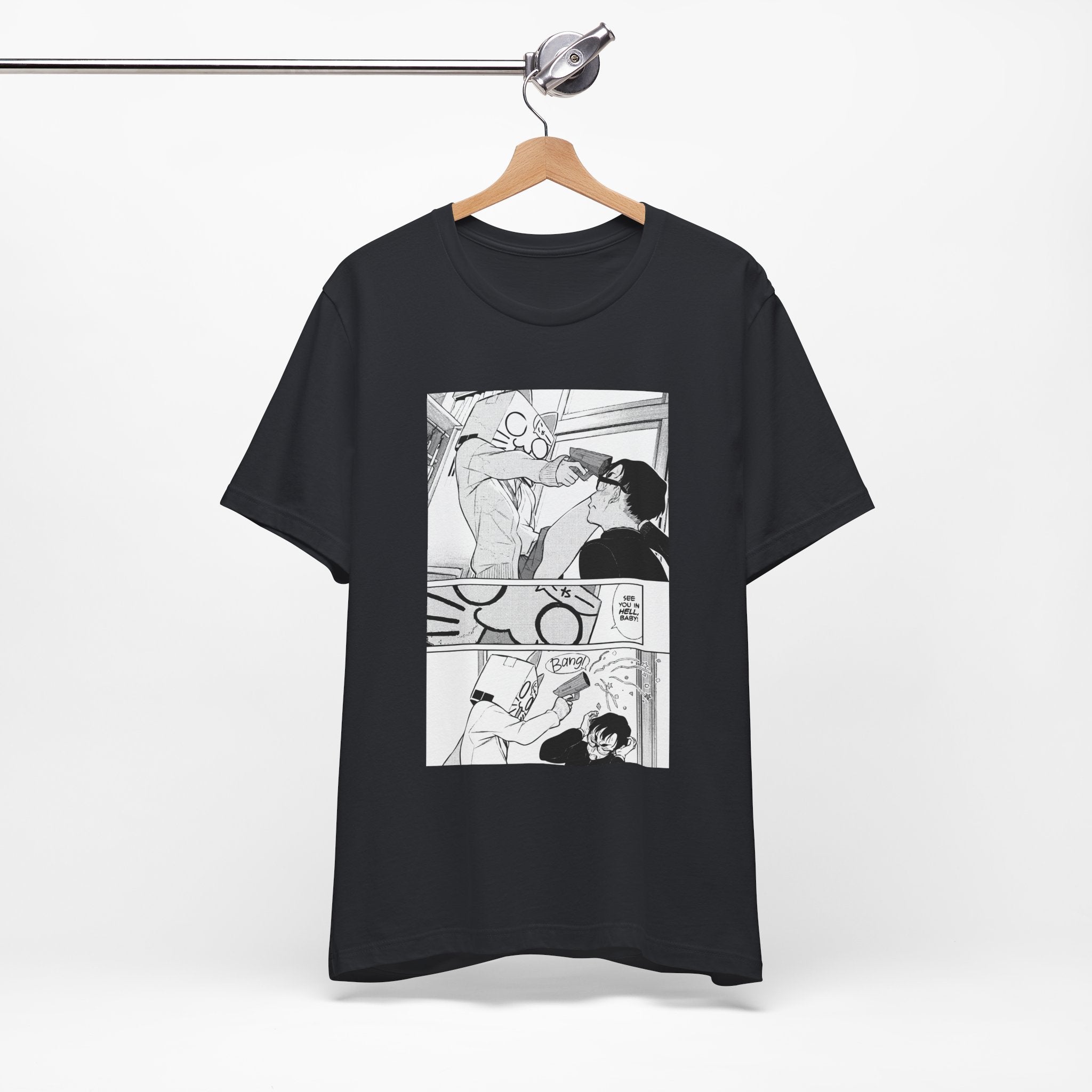 Black t-shirt with comic-style graphic on a hanger against a white background
