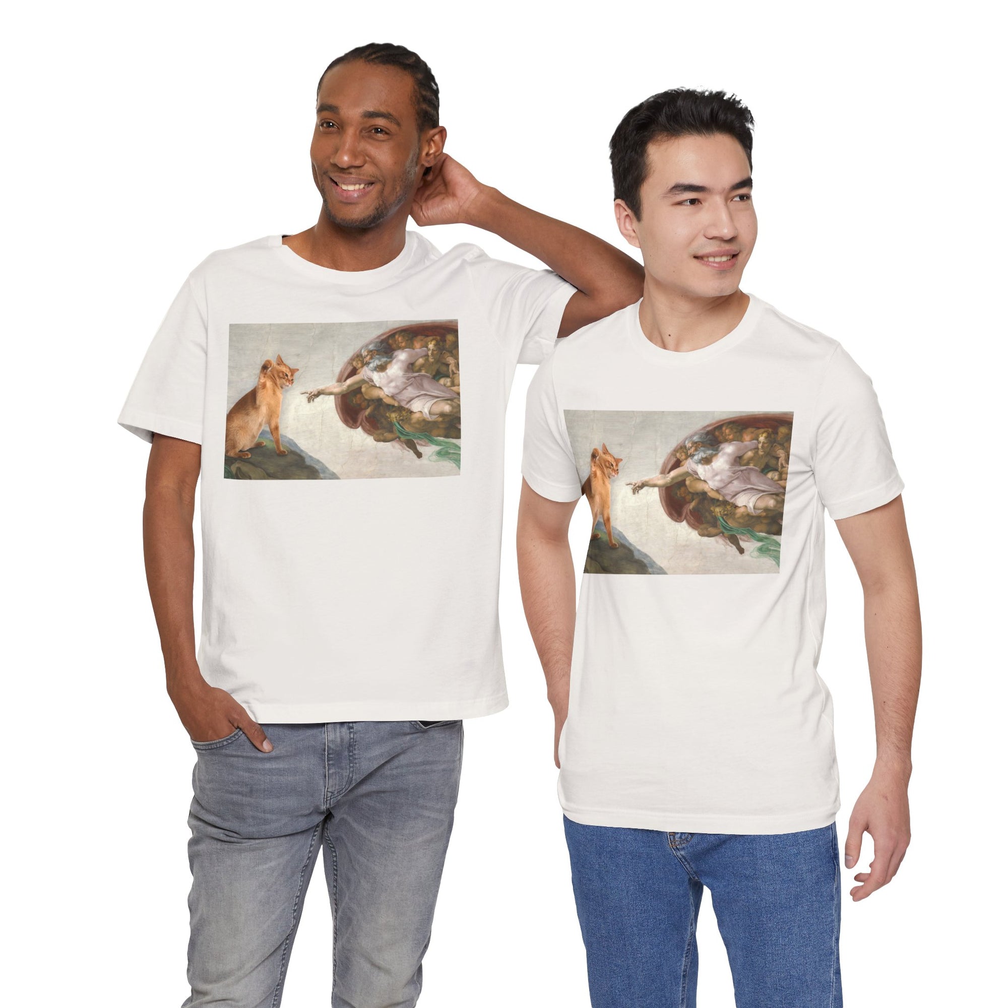 Two men wearing white t-shirts with a graphic design of a cat and god on a white background.