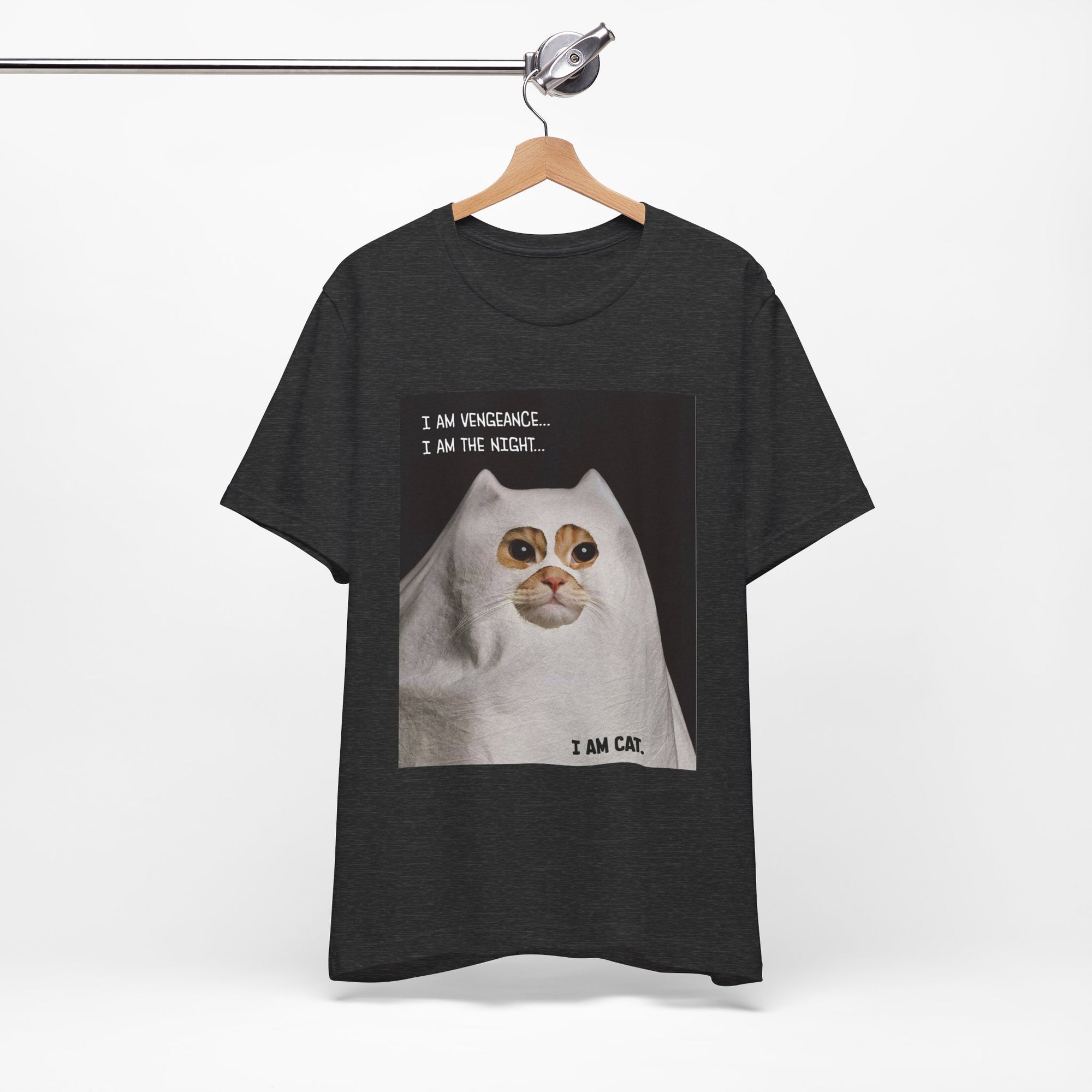 Black t-shirt with a cat graphic and text on a hanger against a white background