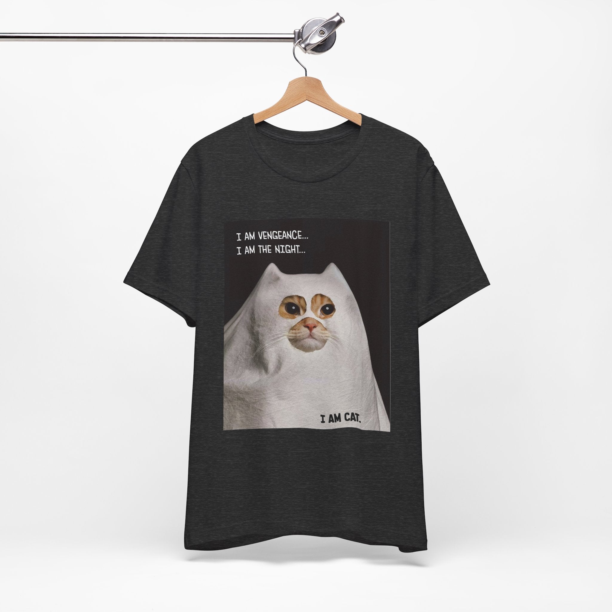 Black t-shirt with a cat graphic and text on a hanger against a white background