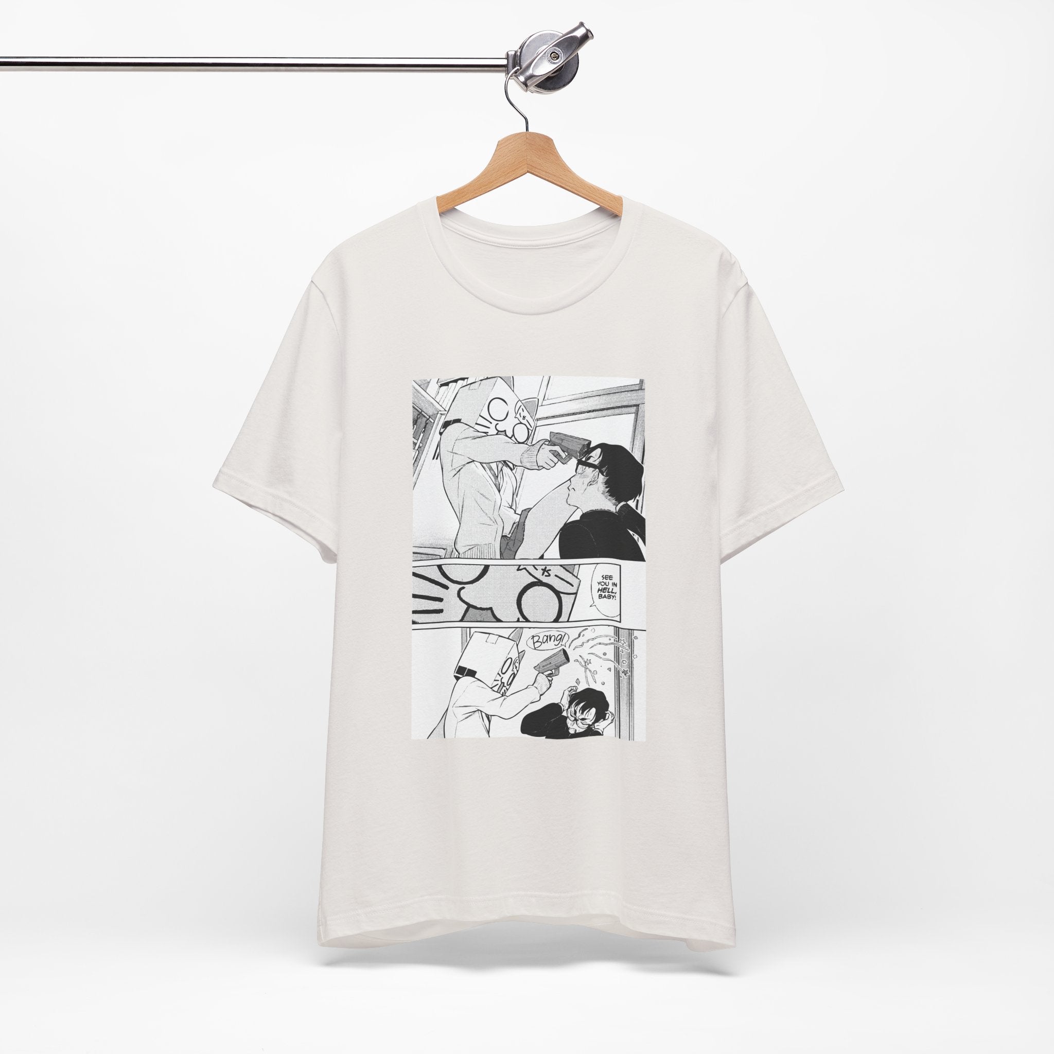 White t-shirt with black comic strip design on a hanger against a white background
