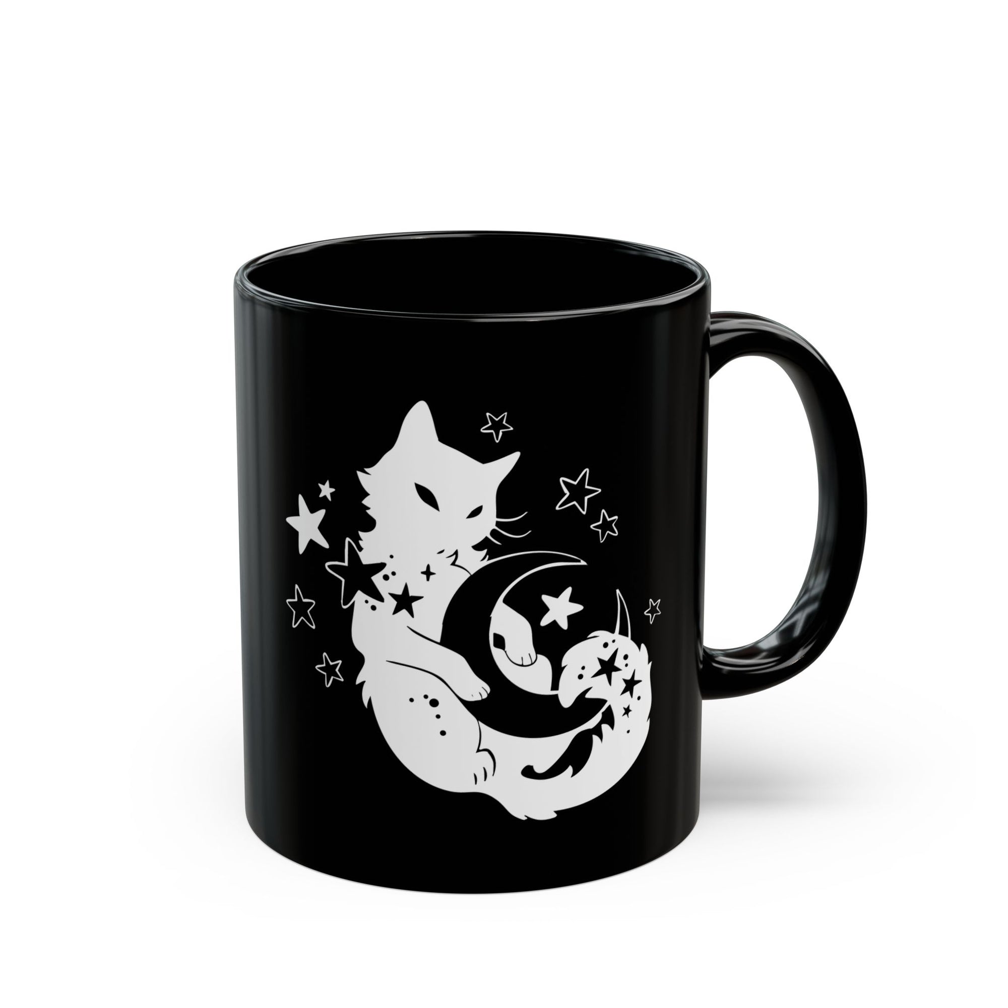 Black mug with white cat and moon design on a white background