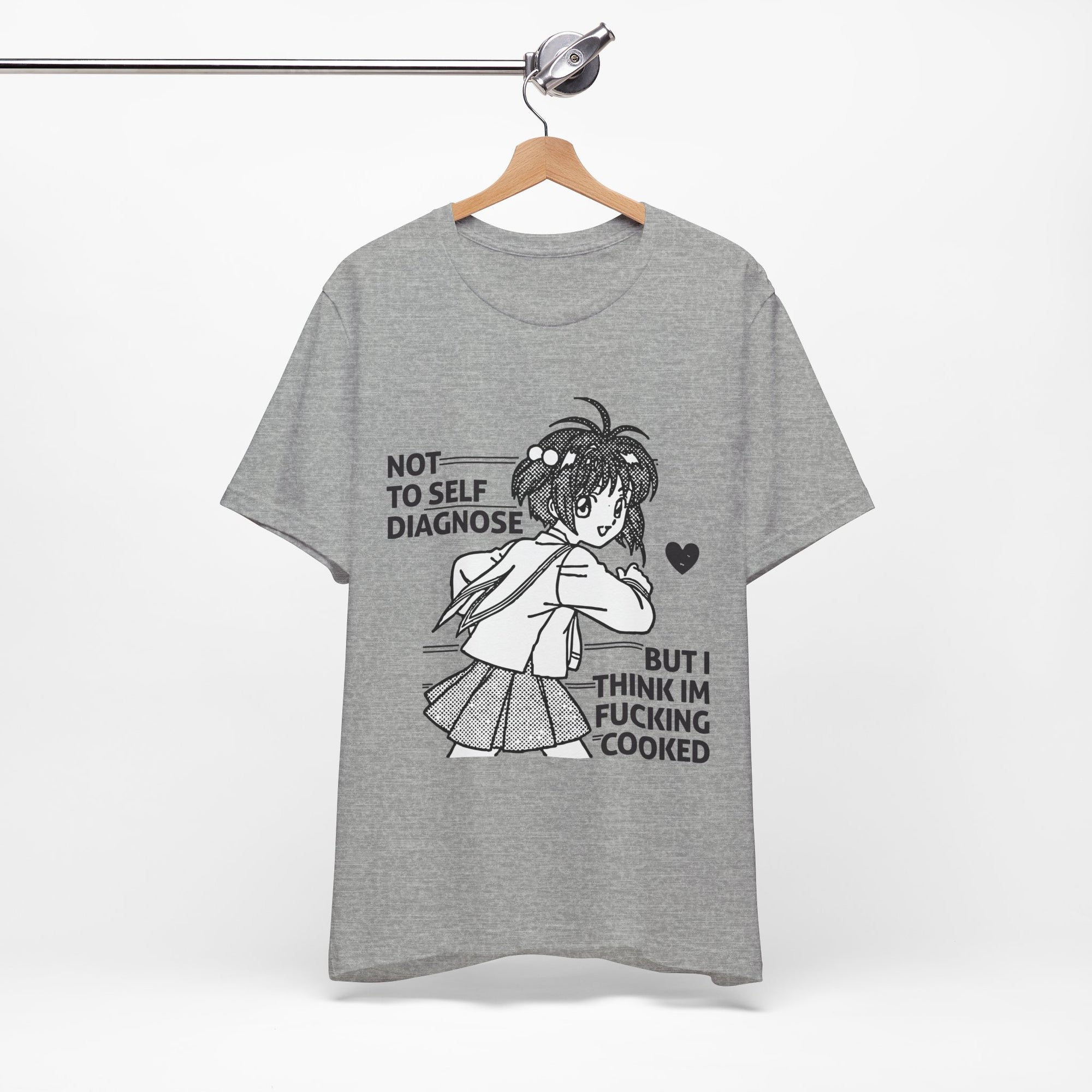 Gray t-shirt with graphic design and text on a hanger against a white background