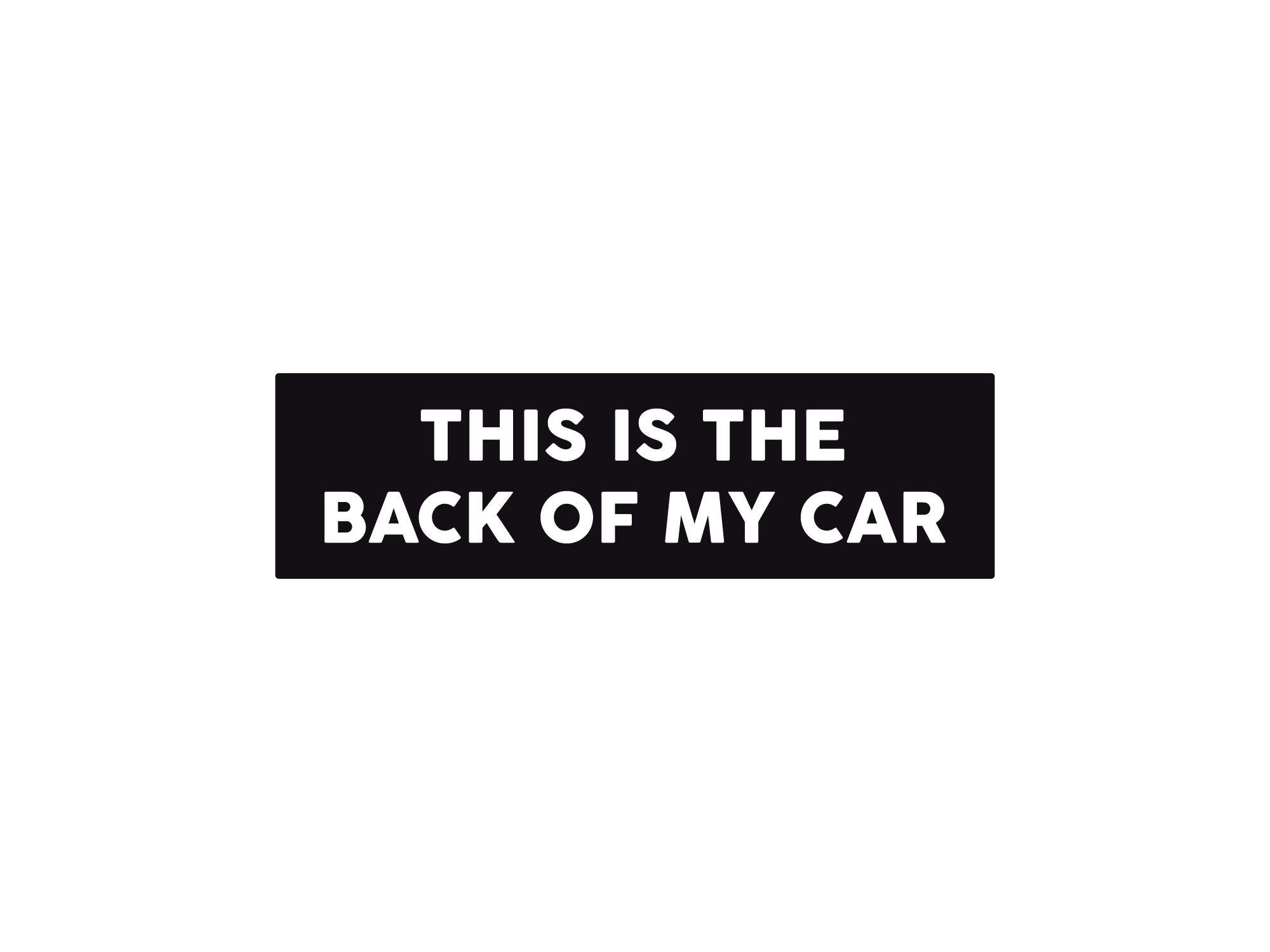 Rectangular black bumper sticker with bold white text that says “This Is the Back of My Car.”
