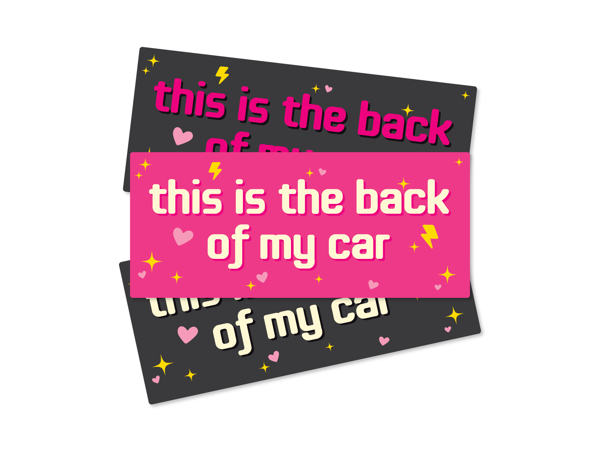 Three rectangular bumper stickers that say “this is the back of my car,” shown in pink and dark gray color options with hearts, sparkles, and lightning bolts.
