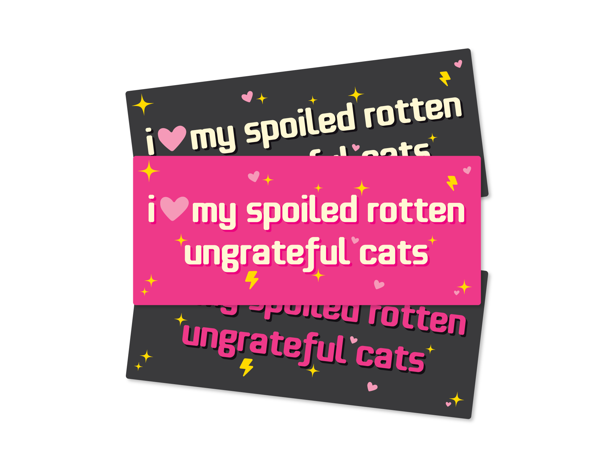 Three rectangular bumper stickers that say “I love my spoiled rotten ungrateful cats,” shown in pink and dark gray color options with hearts, sparkles, and lightning bolts.

