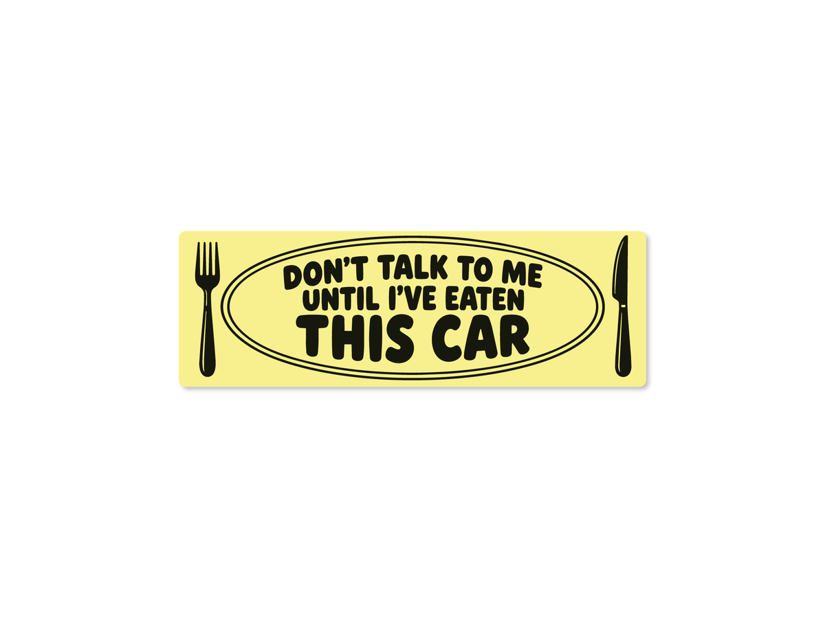 9x3 bumper stickers reading “Don’t Talk to Me Until I’ve Eaten This Car,” shown in pale yellow with black text with fork and knife graphics.