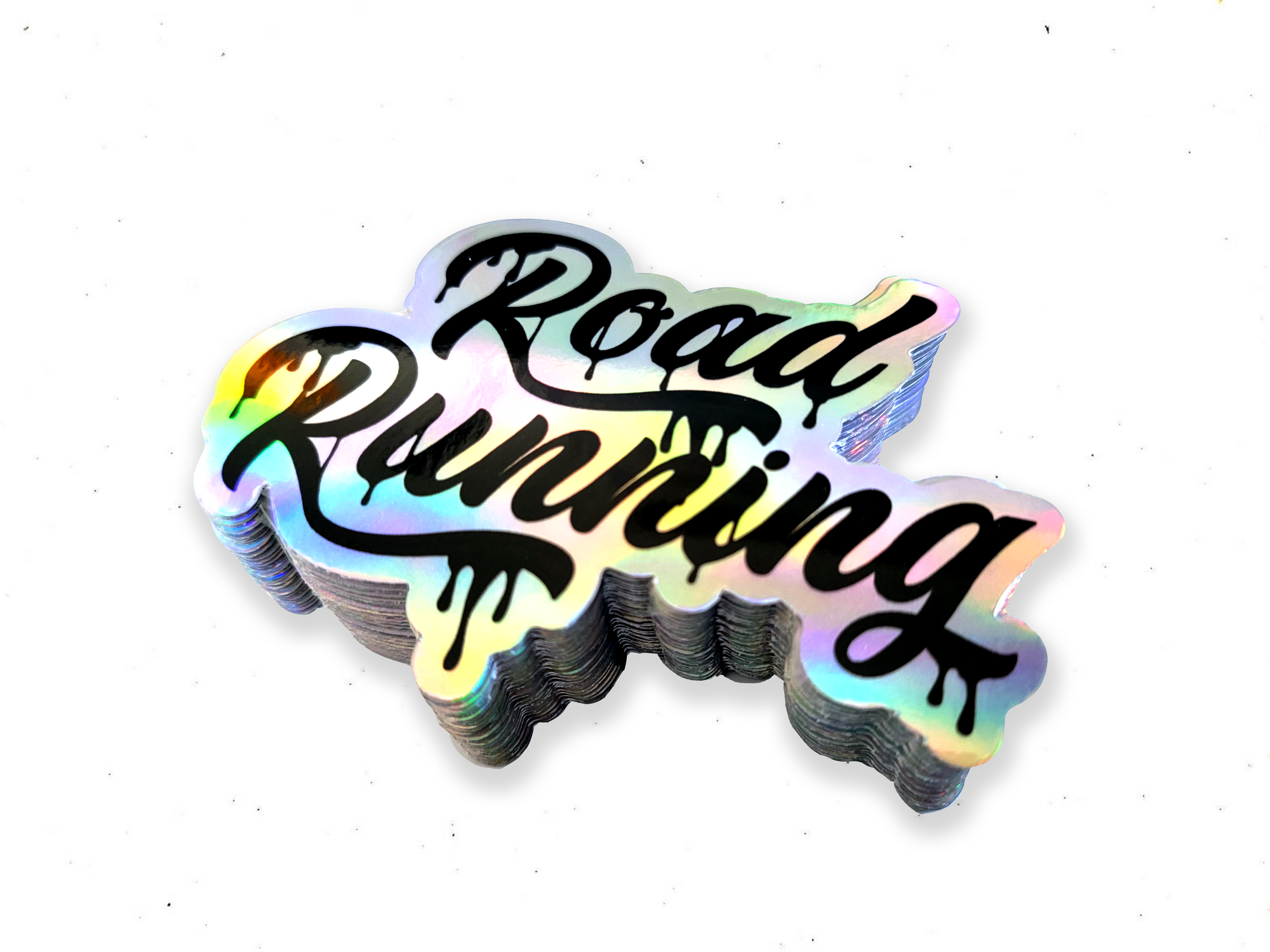 Stack of holographic 'Road Running' stickers on a white background