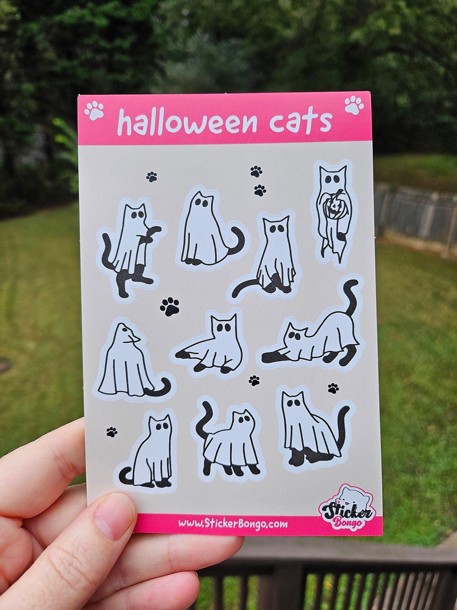 4x6 Halloween sticker sheet with 10 ghost cat vinyl stickers in different poses on a beige background with pink header and footer.