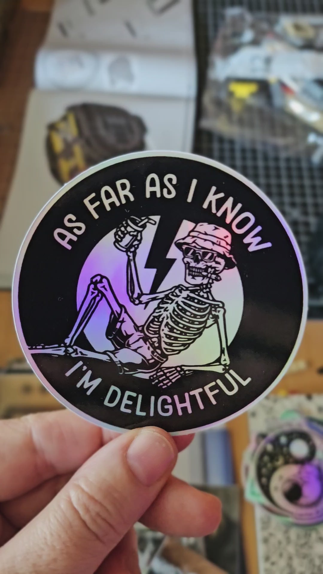Funny As Far As I Know I’m Delightful vinyl sticker with a lounging skeleton design. Waterproof weatherproof sticker for laptops, water bottles, and more.